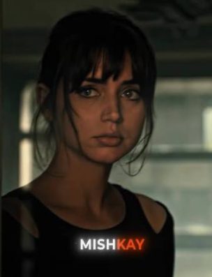 Portrait of a woman with the word Mishkay over the image